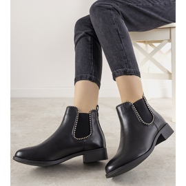 Classic black ankle boots with an elastic band and Merino studs 1