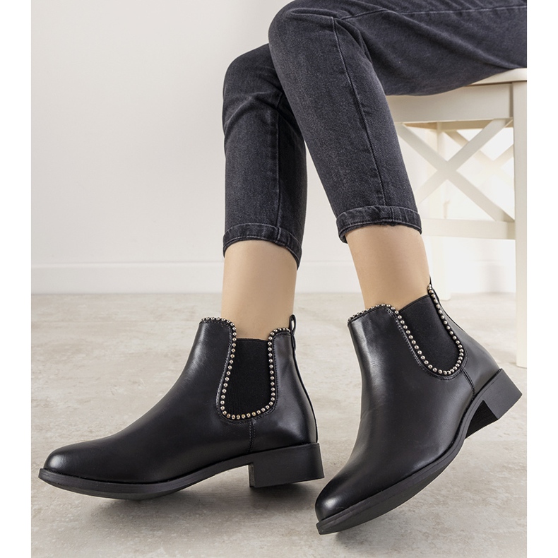Classic black ankle boots with an elastic band and Merino studs 1