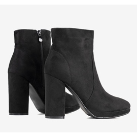 Merrados women's black boots on the post 1