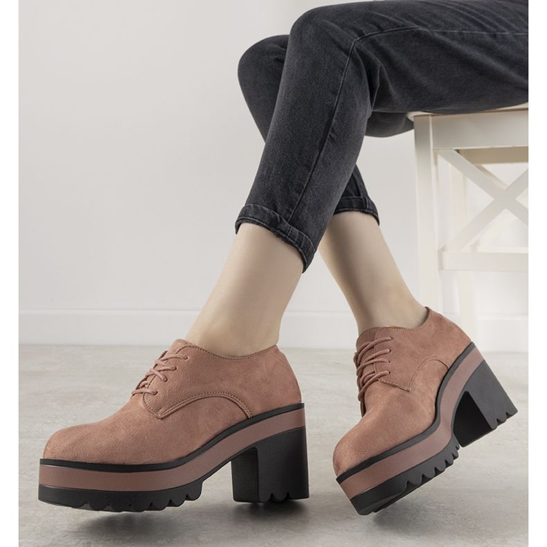 Pink lace-up ankle boots on the Cecina post 1