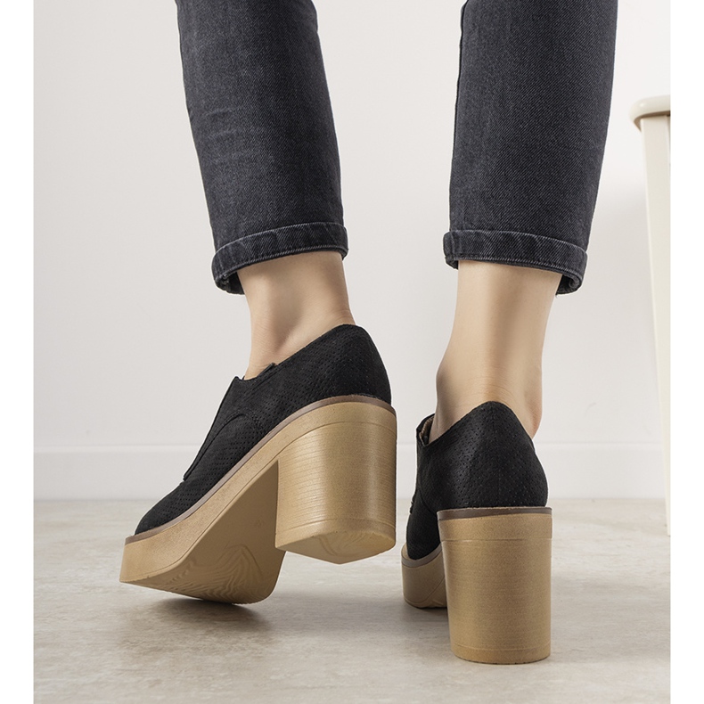 Black lace-up ankle boots on the Cascio post 1