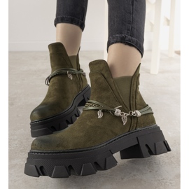 Green boots with a Fearless bracelet 1