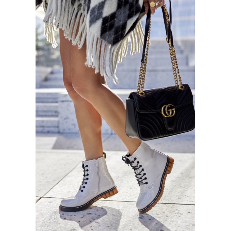 PE1 Lacquered Workers Booties On A White Slider Stock 2