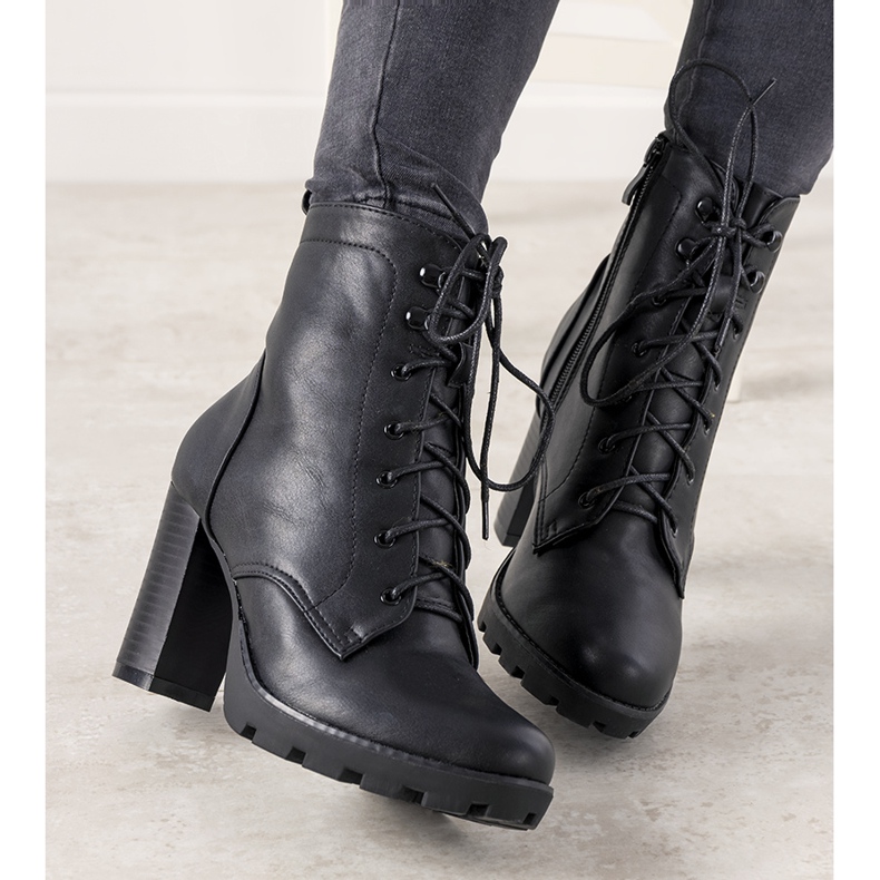 Black women's ankle boots with a binding on the Najera post 1