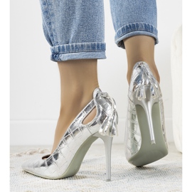 Silver pins with decorative Permewan cutouts 1