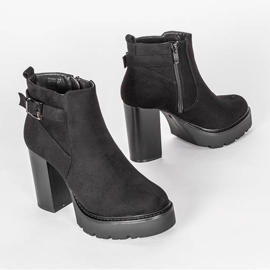 Black ankle boots on Katie's post 1