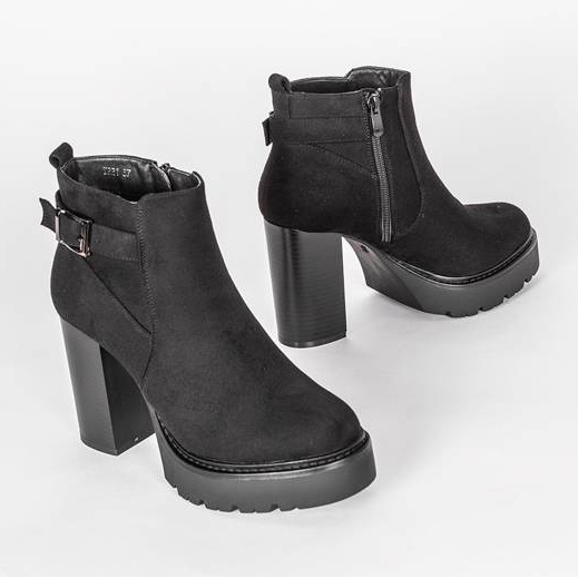 Black ankle boots on Katie's post 1