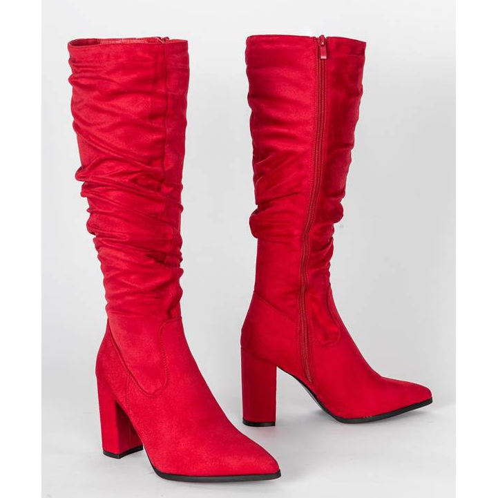 Red boots on a high Swing post 1