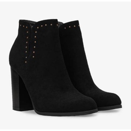 Black ankle boots on the Cosette post 1