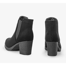 Black ankle boots on the Lasha post 1