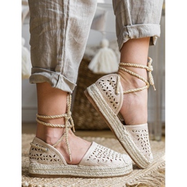 Peekaboo beige openwork espadrilles 1