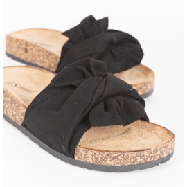 Black slippers with a Step Of Pleasure bow 1