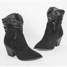 Black cowboy boots with a taller Hallie upper 1