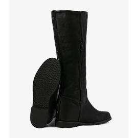 Black boots on a covered Heis wedge 2