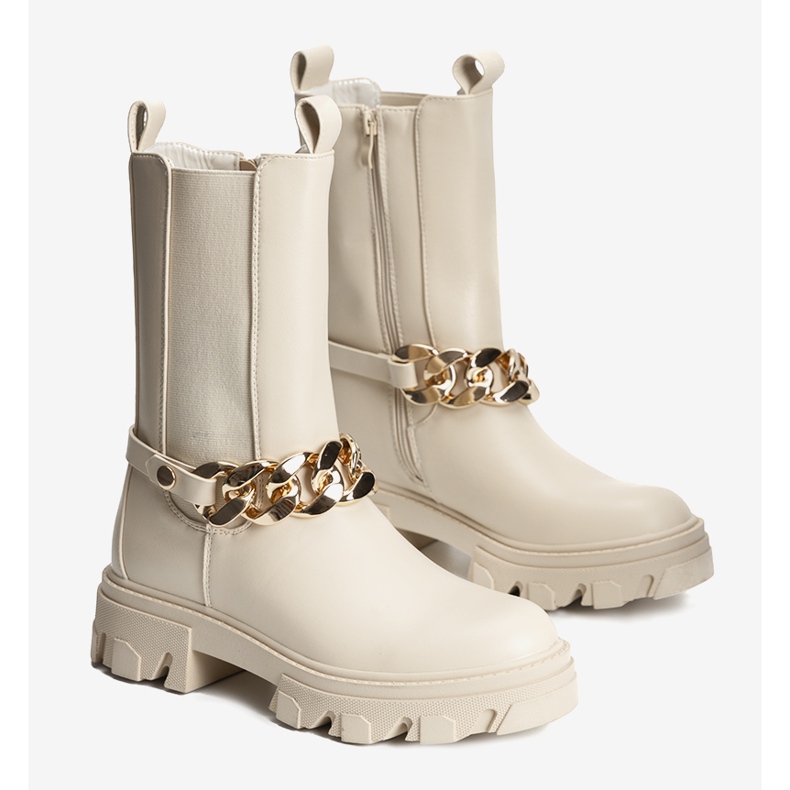 Beige boots with a gold Luce chain 1