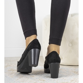 Black loafers on the Himmel post 1