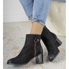 Black boots with abrasions from Montano 1