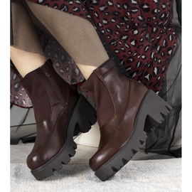 Brown boots on a high Halette sole 1