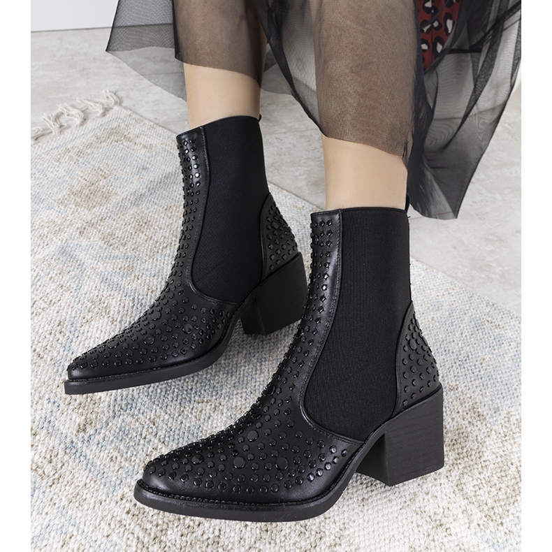 Black boots decorated with Camus studs 1