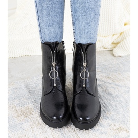 Black boots with a decorative Parnell zipper 1