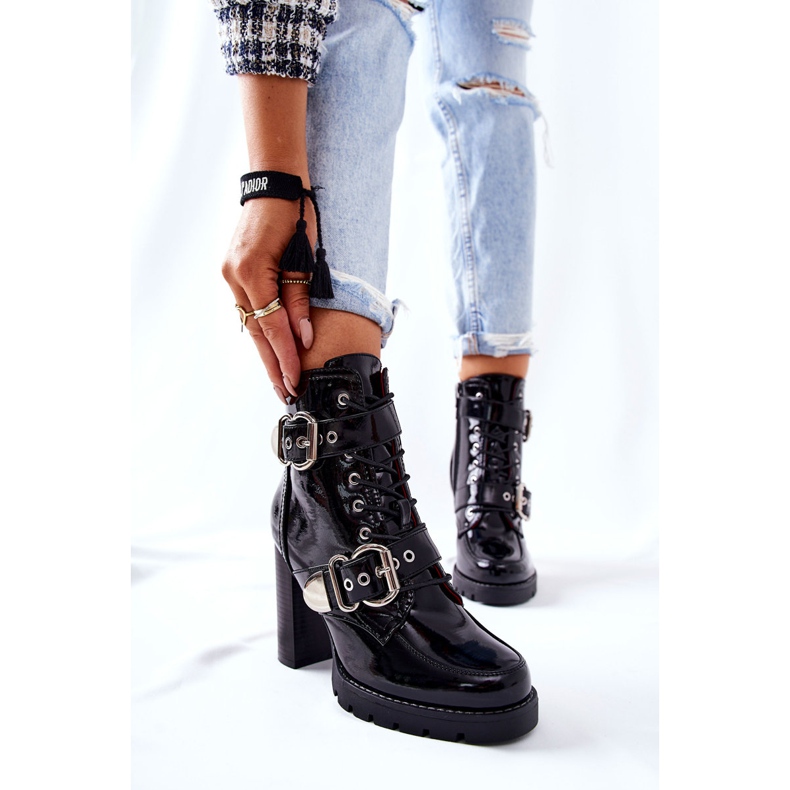 Lacquered Boots On A Bar Black Flaris With A Buckle 1