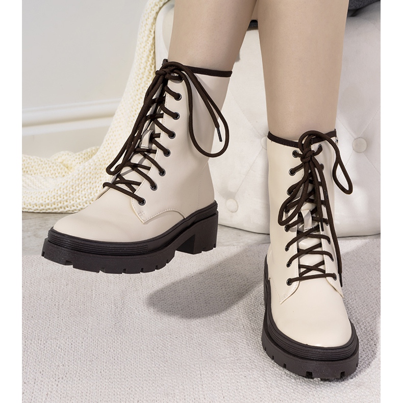 Beige insulated boots on a thick Dena sole 1