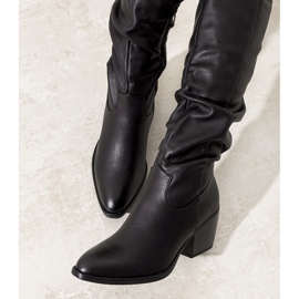 Black boots on the Landry post 1
