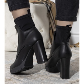 Black ankle boots on the Kizzy post 2