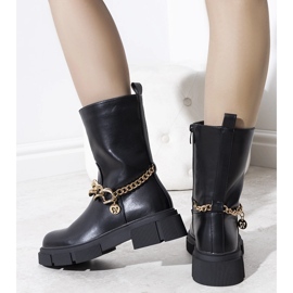 Black insulated boots with a gold Marsha chain 1