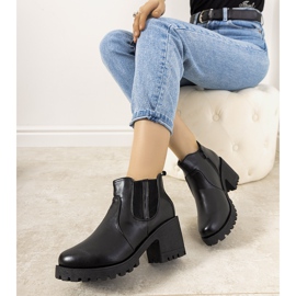 Black insulated boots on the Bevis post 1