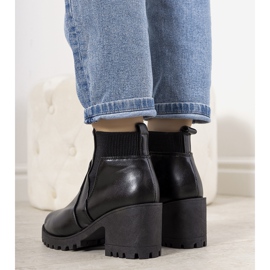 Black insulated boots on the Ruel post 1