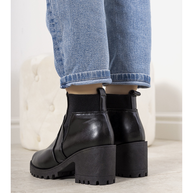 Black insulated boots on the Ruel post 1