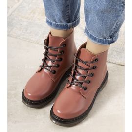 Pink women's insulated boots from Tisserand 2