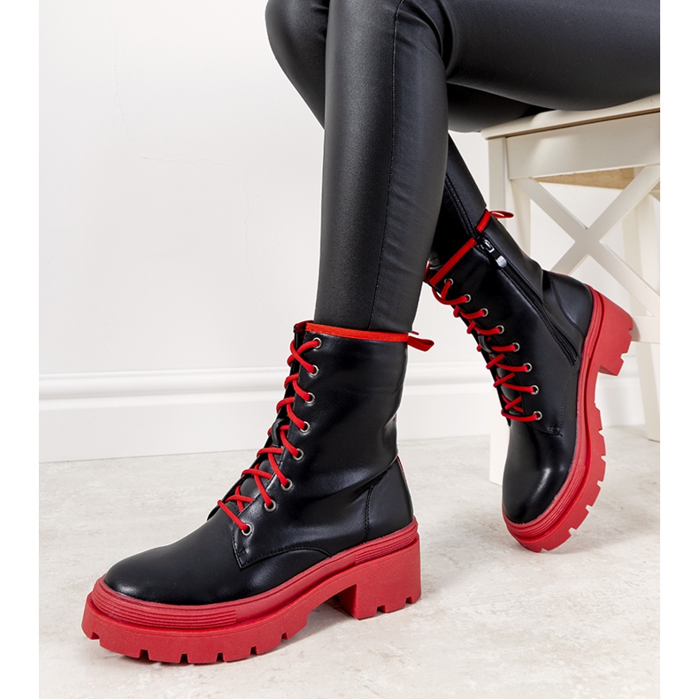 Black boots on a thick sole from Dena red 1 Black boots on a thick sole from Dena red 1