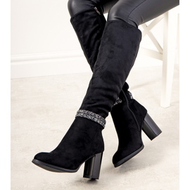 Black boots on the post of insulated Alexis 1