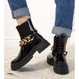 Black patent ankle boots with a Tapia chain 1