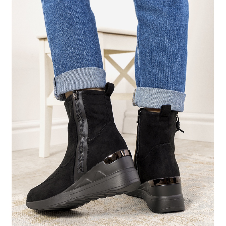 Black insulated wedge boots from Valdez 1
