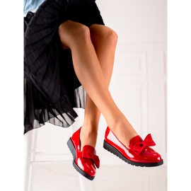 La.Fi Lacquered shoes with a bow 1