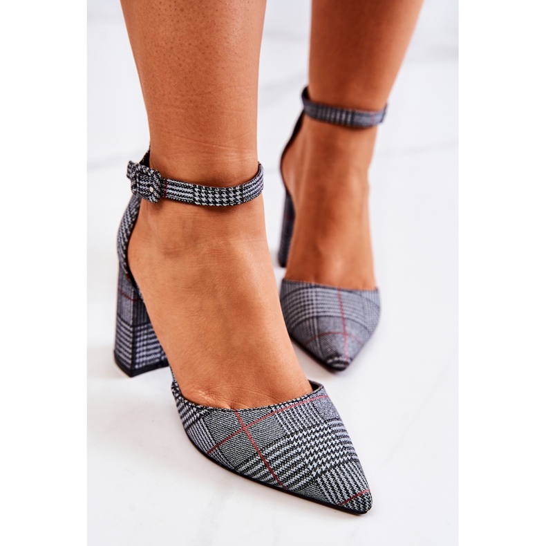 PS1 Pumps On A Black And White Checkered Post Harye 1