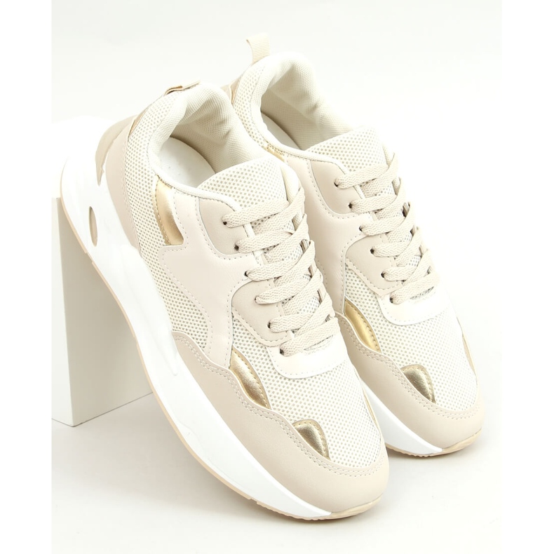 Astro Beige trainers golden 1