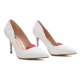 White lacquered heels with a Sonia face 1