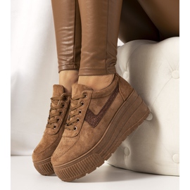 Brown sneakers with a high botanical sole 1