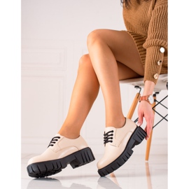 Beige shoes on the La.Fi platform 1