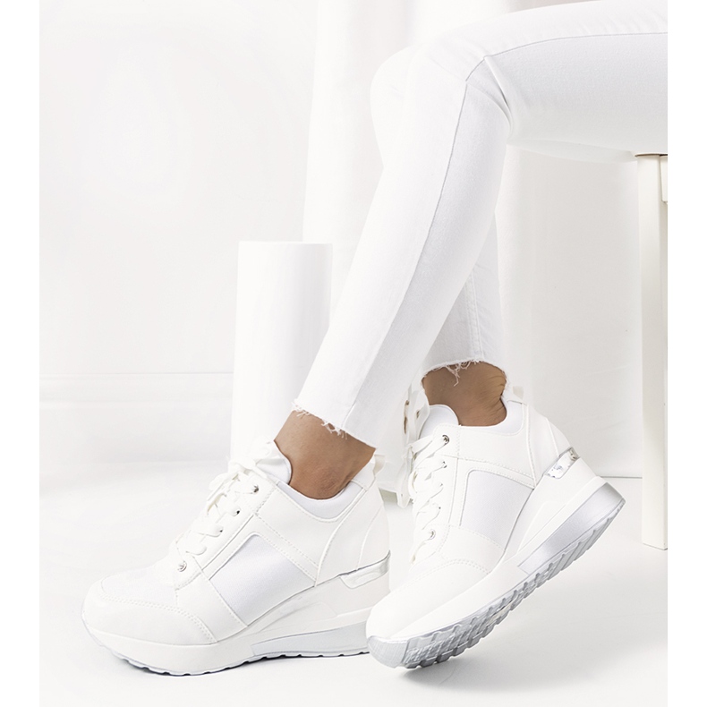 White sneakers on the Lockett wedge silver 1