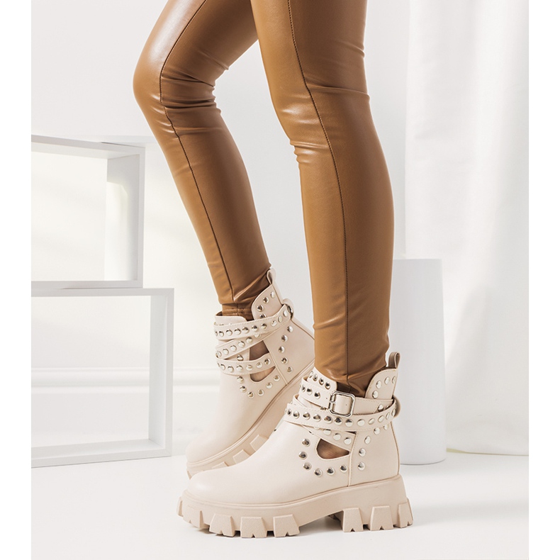 Beige boots with Kinney studs 1