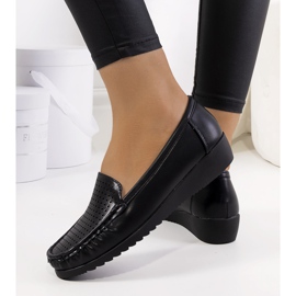 Black moccasins on the Dalal wedge heel 1