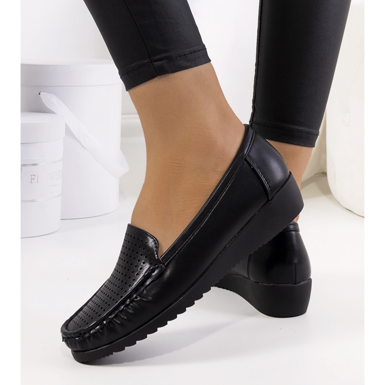Black moccasins on the Dalal wedge heel 1