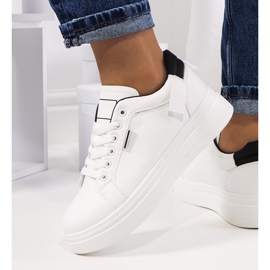 White sneakers on the Perales platform 1