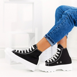 Black sneakers on a high Berrios sole 1