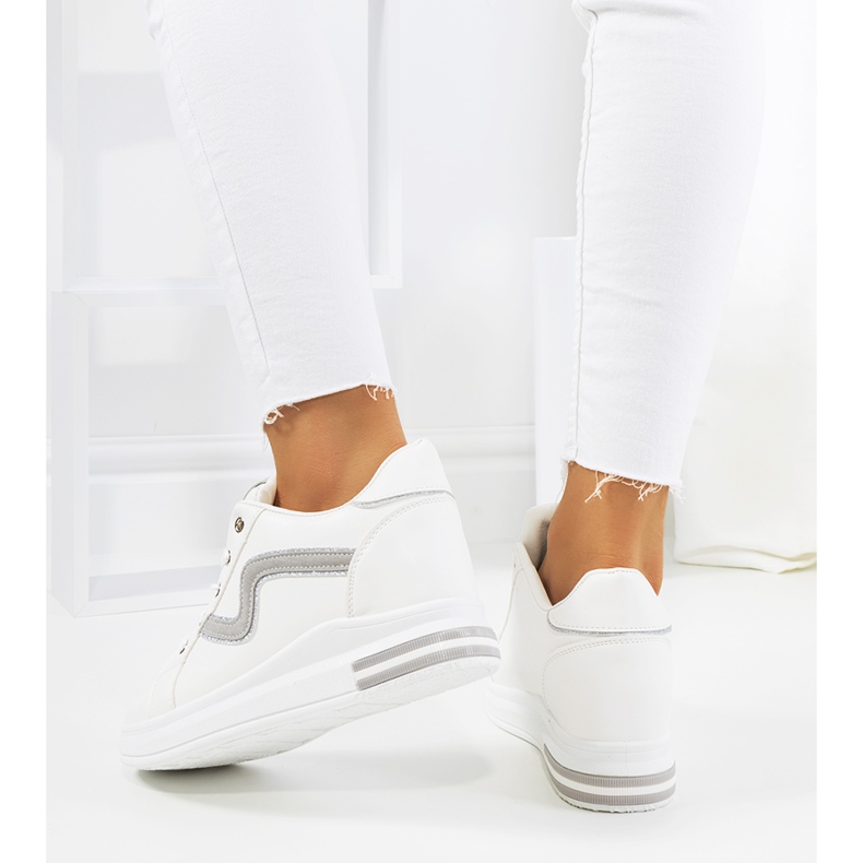 White sneakers on the Piazza wedge 1